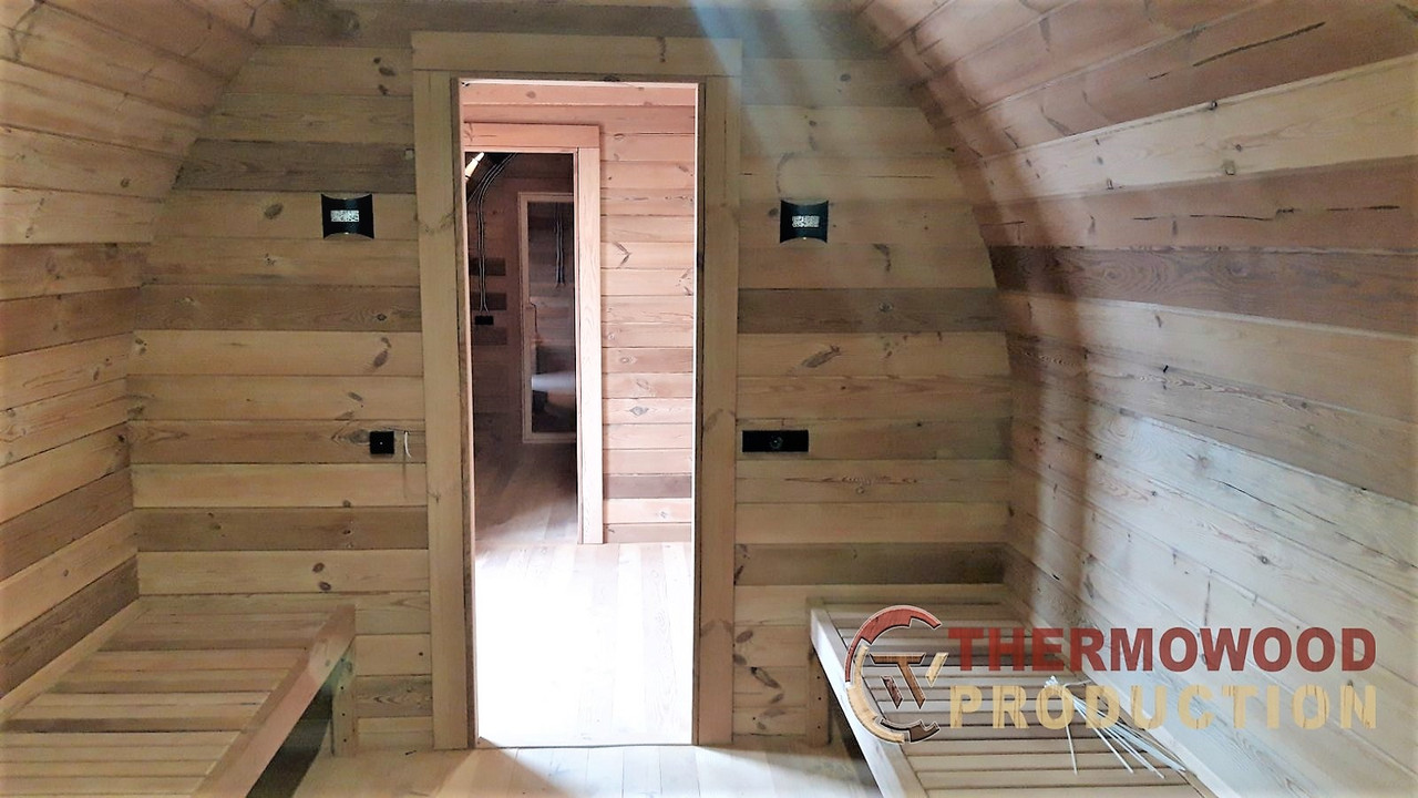 Баня-бочка в стиле Викинг, Иглу 6,0х2,4х2,7м. Outdoor POD Sauna Igloo. Доставка бань бочек в стиле Иглу по Украине и Европе нашим транспортом. Отправка на экспорт бань бочек: услуги затаможки бань бочек, оформление всех сертификатов: сертификат Евро 1 для удешевления растаможки, фито сертификат, сертификат нашего производства. Сауна в стиле Иглу имеет уникальный дизайн, которая украсит любой участок. Изготовлена вручную на нашем производстве из разных видов древесины. Купить готовую деревянную баню-бочку в стиле Иглу под ключ у производителя: (+38) 067-410-49-33 Viber, Telegram, WhatsApp